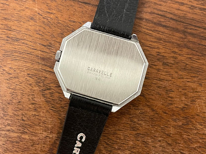 (1974) Caravelle dress watch - octagon case - brushed silver dial w/ stick markers (mint)