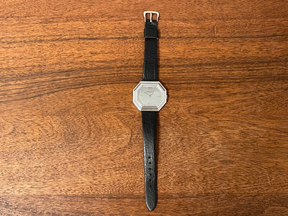 (1974) Caravelle dress watch - octagon case - brushed silver dial w/ stick markers (mint)