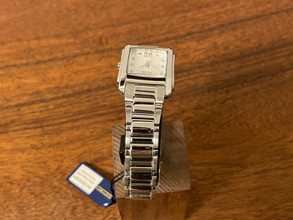 (1999) Seiko 7N01-0FW0  - "Tank" style case - silver dial w/ silver Roman numerals - small size (NOS)