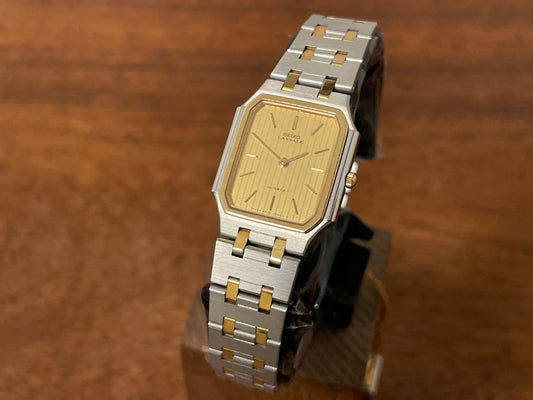 Front side (1982) Seiko 8420-5899 Lassale dress watch - bi-color integrated bracelet & case - gold pyjama dial w/ gold stick markers - small size (NOS)