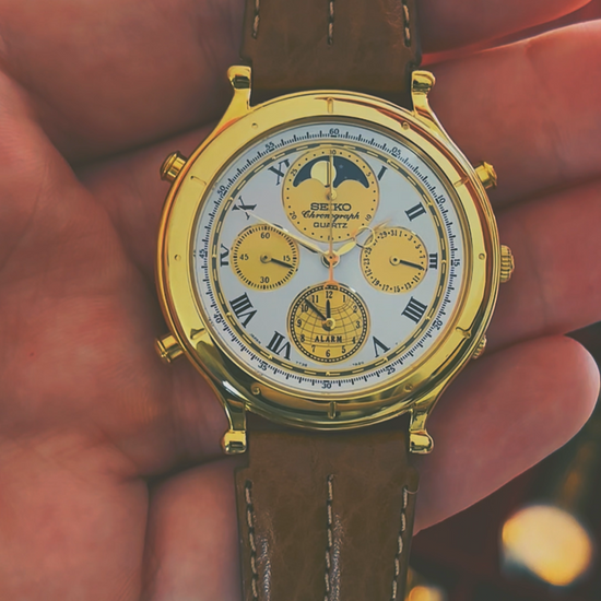 Video of (1990) Seiko 7T36-7A10 Age of Discovery (AOD) chronograph - gold colored case - white dial w/ gold subdials & moonphase